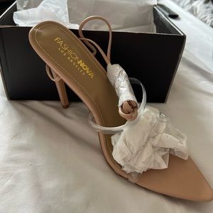 Brand new pair of fashion Nova lace up nude heels